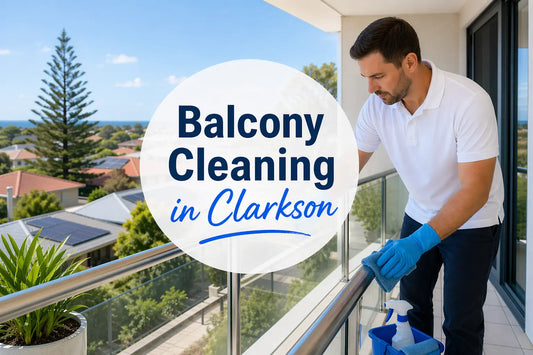 A cleaner cleaning balcony
