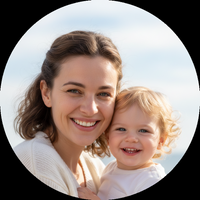 Woman and child smiling together outdoors