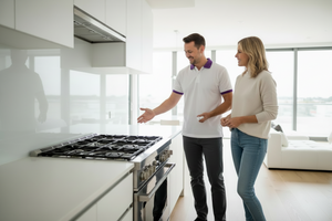 a cleaner showing kitchen stove cleaned